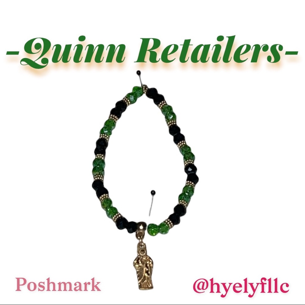 Beaded bracelet with religious piece charm